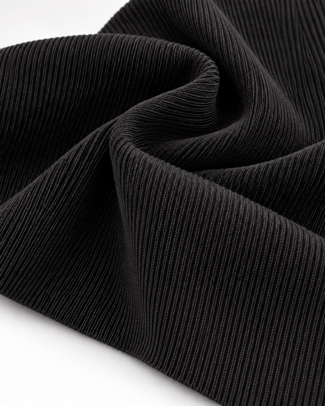 Black rib knit fabric showing fine vertical ribs and a dense elastic texture.