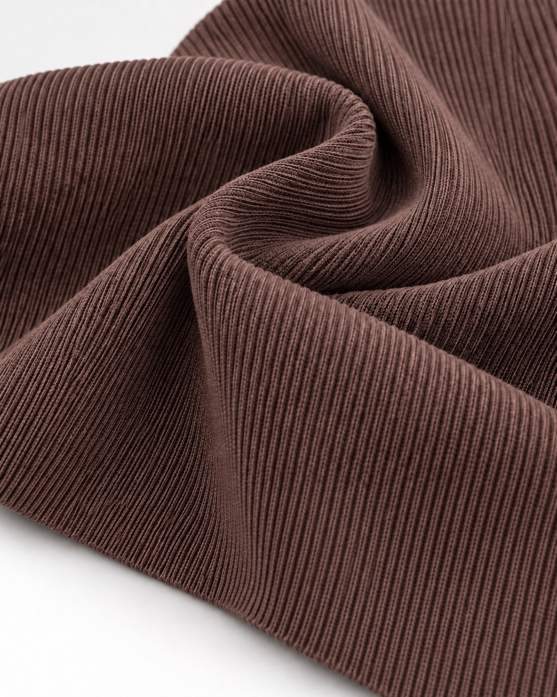 Chocolate rib knit fabric showing fine vertical ribs and a dense elastic texture.