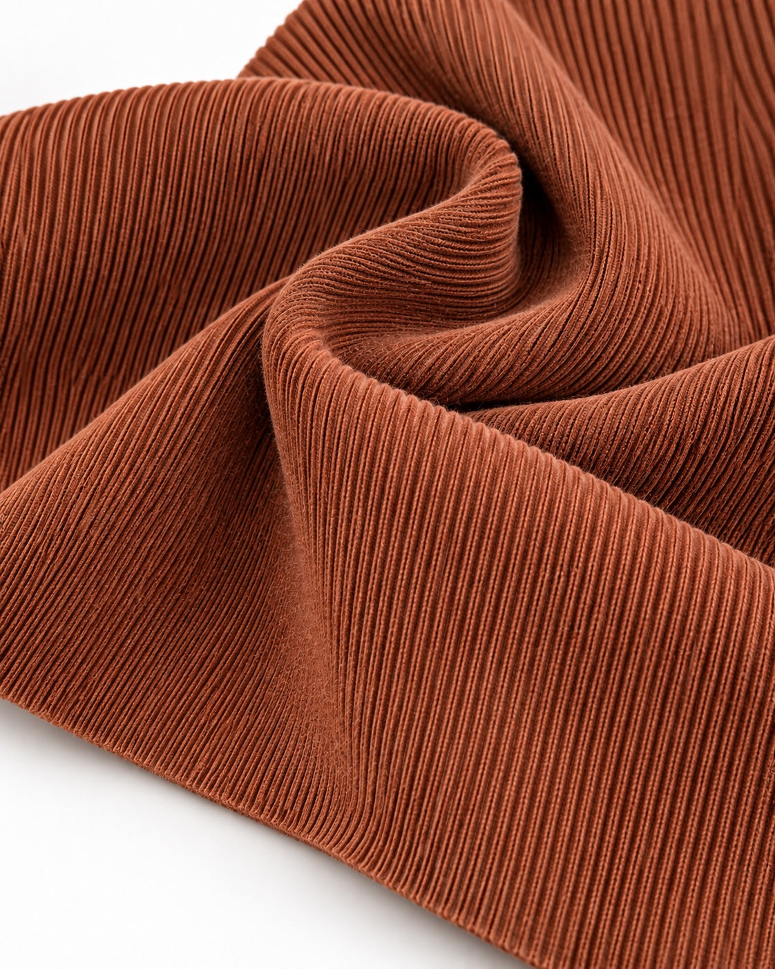 Mocha Mousse rib knit fabric showing fine vertical ribs and a dense elastic texture.